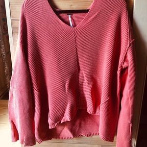 Lovely melon sweater.